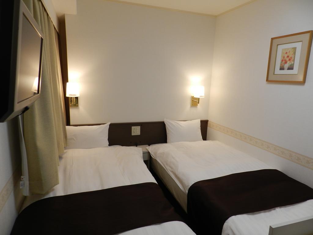 Check In Matsuyama Hotel Мацуяма Стая снимка