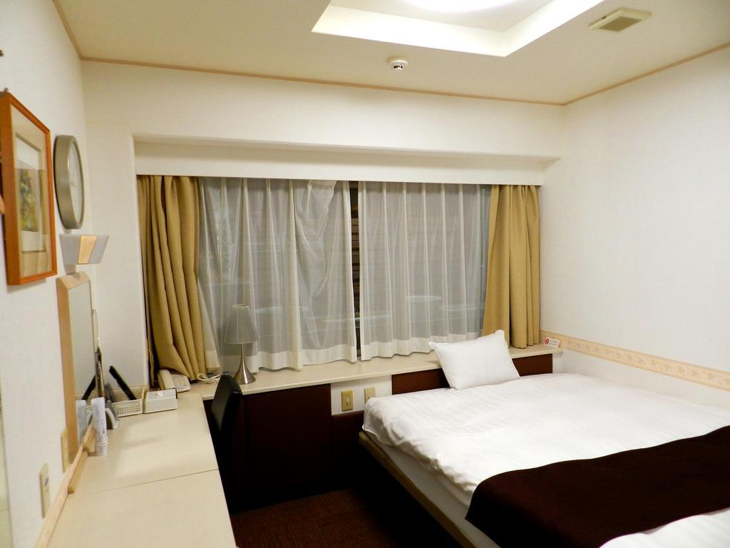 Check In Matsuyama Hotel Мацуяма Екстериор снимка