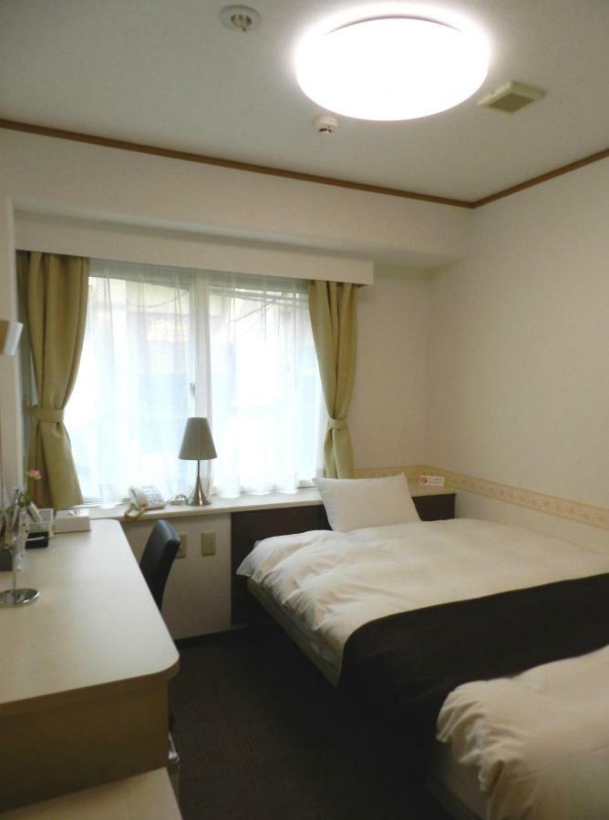 Check In Matsuyama Hotel Мацуяма Екстериор снимка